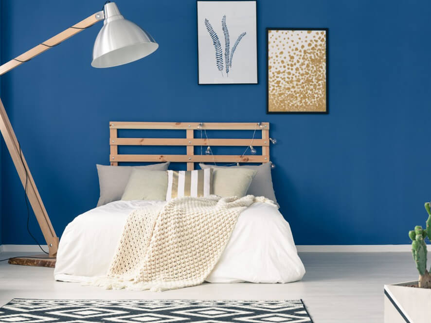 Minimalist Navy Blue Bedroom With Giant Lamp